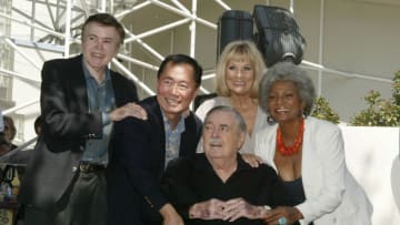 LOS ANGELES - AUGUST 31: Actor James Doohan who is flanked by former fellow cast members from the 60's TV series Star Trek recieves his star on the Hollywood Walk of Fame August 31, 2004 in Los Angeles, California. (Photo by Mark Mainz/Getty Images)