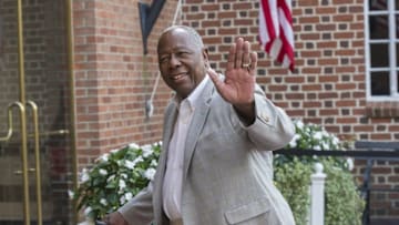 Jul 25, 2015; Cooperstown, NY, USA; Hall of Famer Hank Aaron waves after arriving at National Baseball Hall of Fame. Mandatory Credit: Gregory J. Fisher-USA TODAY Sports