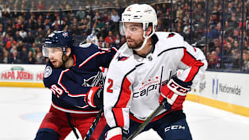 COLUMBUS, OH - FEBRUARY 26: Oliver Bjorkstrand #28 of the Columbus Blue Jackets and Matt Niskanen #2 of the Washington Capitals chase after the puck on February 26, 2018 at Nationwide Arena in Columbus, Ohio. (Photo by Jamie Sabau/NHLI via Getty Images)