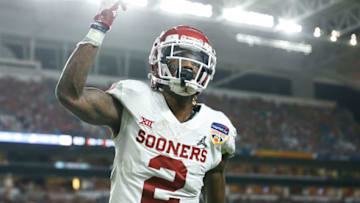 MIAMI, FL - DECEMBER 29: CeeDee Lamb #2 of the Oklahoma Sooners reacts after completing the catch for a touchdown in the fourth quarter during the College Football Playoff Semifinal against the Alabama Crimson Tide at the Capital One Orange Bowl at Hard Rock Stadium on December 29, 2018 in Miami, Florida. (Photo by Michael Reaves/Getty Images)