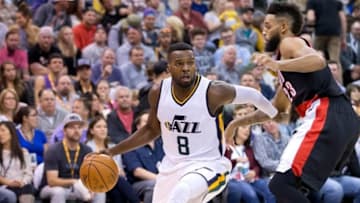 Oct 19, 2016; Salt Lake City, UT, USA; Utah Jazz guard Shelvin Mack (8) dribbles the ball as Portland Trail Blazers guard Allen Crabbe (23) defends during the second half at Vivint Smart Home Arena. The Trail Blazers won 88-84. Mandatory Credit: Russ Isabella-USA TODAY Sports