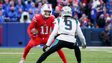 ORCHARD PARK, NEW YORK - DECEMBER 19: Cole Beasley #11 of the Buffalo Bills carries the ball after a catch against Stephon Gilmore #9 of the Carolina Panthers in the second quarter of the game at Highmark Stadium on December 19, 2021 in Orchard Park, New York. (Photo by Kevin Hoffman/Getty Images)