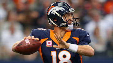 ARLINGTON, TX - OCTOBER 06: Peyton Manning #18 of the Denver Broncos throws against the Dallas Cowboys in the first quarter at AT&T Stadium on October 6, 2013 in Arlington, Texas. (Photo by Ronald Martinez/Getty Images)