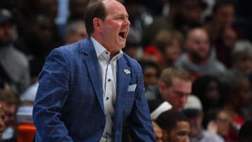 Mar 11, 2020; Nashville, Tennessee, USA; Mississippi Rebels head coach Kermit Davis yells from the bench during the first half against the Georgia Bulldogs at Bridgestone Arena. Mandatory Credit: Christopher Hanewinckel-USA TODAY Sports