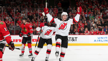 CHICAGO, IL - DECEMBER 23: Jack Hughes #86 of the New Jersey Devils reacts after scoring against the Chicago Blackhawks in the first period at the United Center on December 23, 2019 in Chicago, Illinois. (Photo by Chase Agnello-Dean/NHLI via Getty Images)