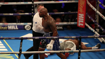 22nd December 2018, The O2 Arena, London, England; WBC Silver and WOB International Heavyweight Championship Boxing, Dillian Whyte versus Dereck Chisora; Dillian Whyte celebrates his KO win as Derek Chisora is unconscious on the canvas (photo by Shaun Brooks/Action Plus via Getty Images)