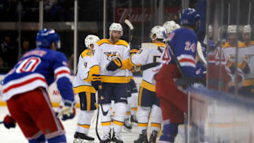 Dec 16, 2019; New York, NY, USA; Nashville Predators defenseman Mattias Ekholm (14) celebrates scoring a goal with teammates against the New York Rangers during the second period at Madison Square Garden. Mandatory Credit: Adam Hunger-USA TODAY Sports