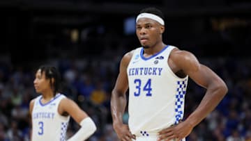 INDIANAPOLIS, INDIANA - MARCH 17: Oscar Tshiebwe #34 of the Kentucky Wildcats looks on during the second half against the Saint Peter's Peacocks in the first round game of the 2022 NCAA Men's Basketball Tournament at Gainbridge Fieldhouse on March 17, 2022 in Indianapolis, Indiana. (Photo by Andy Lyons/Getty Images)