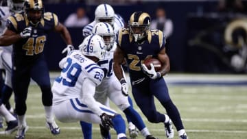 Aug 29, 2015; St. Louis, MO, USA; St. Louis Rams running back Isaiah Pead (24) carries the ball as Indianapolis Colts strong safety Mike Adams (29) closes in during the second quarter of a football game at the Edward Jones Dome. Mandatory Credit: Scott Kane-USA TODAY Sports