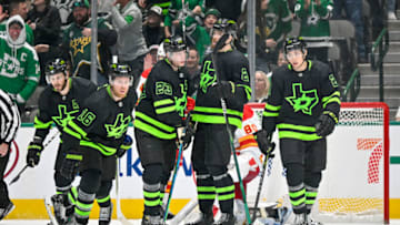 Jan 14, 2023; Dallas, Texas, USA; Dallas Stars center Tyler Seguin (91) and center Joe Pavelski (16) and defenseman Esa Lindell (23) and defenseman Jani Hakanpaa (2) and left wing Jason Robertson (21) skate off the ice after center Joe Pavelski (16) scores his second goal of the game against Calgary Flames goaltender Dan Vladar (80) during the third period at the American Airlines Center. Mandatory Credit: Jerome Miron-USA TODAY Sports