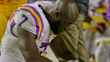 Nov 14, 2015; Baton Rouge, LA, USA; LSU Tigers running back Leonard Fournette (7) watches from the bench during the fourth quarter of a game against the Arkansas Razorbacks at Tiger Stadium. Arkansas defeated LSU 31-14. Mandatory Credit: Derick E. Hingle-USA TODAY Sports