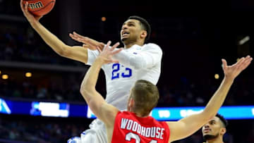 Mar 17, 2016; Des Moines, IA, USA; Kentucky Wildcats guard Jamal Murray (23) shoots the ball against Stony Brook Seawolves guard Lucas Woodhouse (34) during the first half in the first round of the 2016 NCAA Tournament at Wells Fargo Arena. Mandatory Credit: Jeffrey Becker-USA TODAY Sports