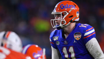 MIAMI, FLORIDA - DECEMBER 30: Kyle Trask #11 of the Florida Gators under center during the first half of the Capital One Orange Bowl against the Virginia Cavaliers at Hard Rock Stadium on December 30, 2019 in Miami, Florida. (Photo by Mark Brown/Getty Images)