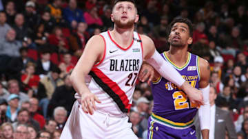 PORTLAND, OR - DECEMBER 21: Thabo Sefolosha #22 of the Utah Jazz and Jusuf Nurkic #27 of the Portland Trail Blazers fight for position on December 21, 2018 at the Moda Center Arena in Portland, Oregon. NOTE TO USER: User expressly acknowledges and agrees that, by downloading and or using this photograph, user is consenting to the terms and conditions of the Getty Images License Agreement. Mandatory Copyright Notice: Copyright 2018 NBAE (Photo by Sam Forencich/NBAE via Getty Images)