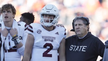 Nov 13, 2021; Auburn, Alabama, USA; Mississippi State Bulldogs quarterback Will Rogers (2) and head coach Mike Leach watch a replay on the video board during the fourth quarter against the Auburn Tigers at Jordan-Hare Stadium. Mandatory Credit: John Reed-USA TODAY Sports