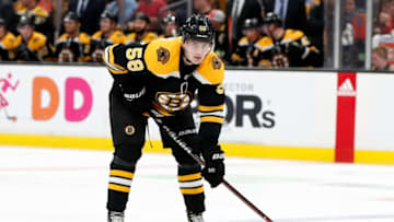 BOSTON, MA - SEPTEMBER 26: Boston Bruins defenseman Urho Vaakanainen (58) eyes a face off during a preseason game between the Boston Bruins and the Detroit Red Wings on September 26, 2018, at TD Garden in Boston, Massachusetts. The Red Wings defeated the Bruins 3-2 (OT). (Photo by Fred Kfoury III/Icon Sportswire via Getty Images)