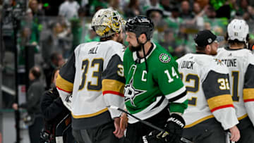 May 29, 2023; Dallas, Texas, USA; Vegas Golden Knights goaltender Adin Hill (33) and Dallas Stars left wing Jamie Benn (14) shake hands on the ice after the Golden Knights defeat the Stars in game six of the Western Conference Finals of the 2023 Stanley Cup Playoffs at American Airlines Center. Mandatory Credit: Jerome Miron-USA TODAY Sports