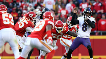 Quarterback Lamar Jackson #8 of the Baltimore Ravens is sacked during overtime (Photo by Jamie Squire/Getty Images)