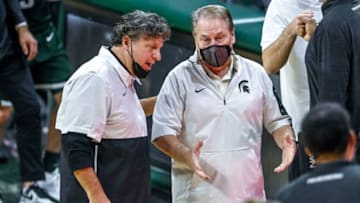 Michigan State's head coach Tom Izzo, right, and Oakland's head coach Greg Kampe talk after the game on Sunday, Dec. 13, 2020, at the Breslin Center in East Lansing.201213 Msu Oakland 178a