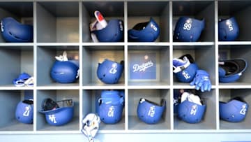 Apr 13, 2016; Los Angeles, CA, USA; General view of Los Angeles Dodgers batting helmets in the dugout during a MLB game against the Arizona Diamondbacks at Dodger Stadium. Mandatory Credit: Kirby Lee-USA TODAY Sports