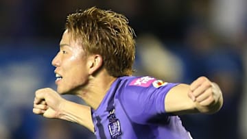 Sanfrecce Hiroshima forward Takuma Asano celebrates his goal against Gamba Osaka during the J-League championship football game in Hiroshima on December 5, 2015. Sanfrecce drew the second game of the championship 1-1 and won the championship with a total score of 4-3. Sanfrecce will play at the FIFA Club World Cup as the host country representative next week. AFP PHOTO / JIJI PRESS JAPAN OUT / AFP / JIJI PRESS / JIJI PRESS (Photo credit should read JIJI PRESS/AFP/Getty Images)