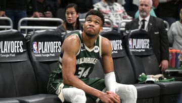 Apr 26, 2023; Milwaukee, Wisconsin, USA; Milwaukee Bucks forward Giannis Antetokounmpo (34) sits on the bench after a 128-126 loss to the Miami Heat during game five of the 2023 NBA Playoffs at Fiserv Forum. Mandatory Credit: Michael McLoone-USA TODAY Sports
