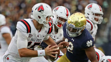 SOUTH BEND, IN - SEPTEMBER 08: Julian Okwara #42 of the Notre Dame Fighting Irish chases Riley Neal #15 of the Ball State Cardinals at Notre Dame Stadium on September 8, 2018 in South Bend, Indiana. Notre Dame defeated Ball State 24-16.(Photo by Jonathan Daniel/Getty Images)