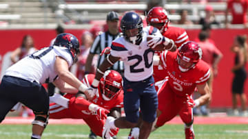Sep 8, 2018; Houston, TX, USA; Arizona Wildcats running back Darrius Smith (20) runs with the ball during the fourth quarter against the Houston Cougars at TDECU Stadium. Mandatory Credit: Troy Taormina-USA TODAY Sports