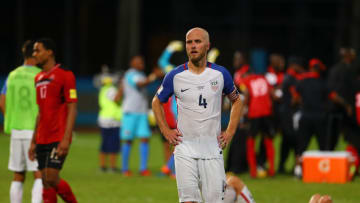 COUVA, TRINIDAD AND TOBAGO - OCTOBER 10: A contrast of emotions as captain Michael Bradley (C) of the United States mens national team reacts as Trinidad and Tobago pull of a win during the FIFA World Cup Qualifier match between Trinidad and Tobago at the Ato Boldon Stadium on October 10, 2017 in Couva, Trinidad And Tobago. (Photo by Ashley Allen/Getty Images)