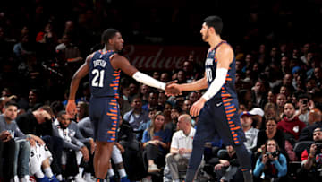 NEW YORK, NY - NOVEMBER 11: Damyean Dotson #21 of the New York Knicks and Enes Kanter #00 of the New York Knicks high five during the game against the Orlando Magic on November 11, 2018 at Madison Square Garden in New York City, New York. NOTE TO USER: User expressly acknowledges and agrees that, by downloading and or using this photograph, User is consenting to the terms and conditions of the Getty Images License Agreement. Mandatory Copyright Notice: Copyright 2018 NBAE (Photo by Nathaniel S. Butler/NBAE via Getty Images)