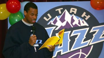 SALT LAKE CITY - JANUARY 31: Jarron Collins of the Utah Jazz reads to students during a Read to Achieve event January 31, 2006 at Meadowlark Elementary school in Salt Lake City, Utah. Copyright 2006 NBAE (Photo By Kent Horner/NBAE via Getty Images)