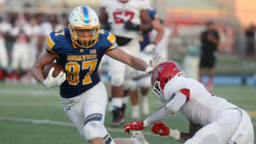 Olentangy High School tight end Gavin Grover carries the ball. The Columbus Dispatch.