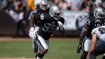 Sep 20, 2015; Oakland, CA, USA; Oakland Raiders defensive end Aldon Smith (99) against the Baltimore Ravens at O.co Coliseum. Mandatory Credit: Kirby Lee-USA TODAY Sports