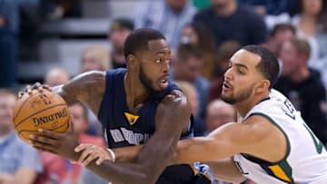 Nov 14, 2016; Salt Lake City, UT, USA; Utah Jazz forward Trey Lyles (41) defends against Memphis Grizzlies forward JaMychal Green (0) during the second half at Vivint Smart Home Arena. Memphis won 102-96. Mandatory Credit: Russ Isabella-USA TODAY Sports