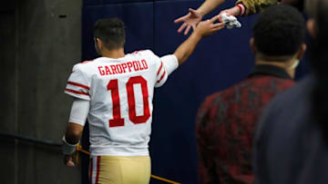 HOUSTON, TX - DECEMBER 10: Jimmy Garoppolo #10 of the San Francisco 49ers gives a towel to fans as he walks up the tunnel after the game against the Houston Texans at NRG Stadium on December 10, 2017 in Houston, Texas. (Photo by Tim Warner/Getty Images)