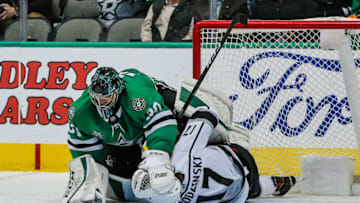 DALLAS, TX - JANUARY 30: Dallas Stars goaltender Ben Bishop (30) lands on top of Los Angeles Kings center Jonny Brodzinski (17) in the crease during the game between the Dallas Stars and the Los Angeles Kings on Tuesday January 30, 2018 at the American Airlines Center in Dallas, Texas. Los Angeles defeats Dallas 3-0. (Photo by Matthew Pearce/Icon Sportswire via Getty Images)