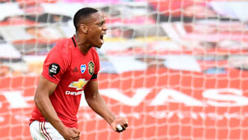 Manchester United's French striker Anthony Martial celebrates scoring their second goal during the English Premier League football match between Manchester United and Southampton at Old Trafford in Manchester, north-west England, on July 13, 2020. (Photo by PETER POWELL / POOL / AFP) / RESTRICTED TO EDITORIAL USE. No use with unauthorized audio, video, data, fixture lists, club/league logos or 'live' services. Online in-match use limited to 120 images. An additional 40 images may be used in extra time. No video emulation. Social media in-match use limited to 120 images. An additional 40 images may be used in extra time. No use in betting publications, games or single club/league/player publications. / (Photo by PETER POWELL/POOL/AFP via Getty Images)