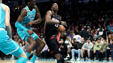 Mark Williams #5 of the Charlotte Hornets defends Bam Adebayo #13 of the Miami Heat(Photo by David Jensen/Getty Images)