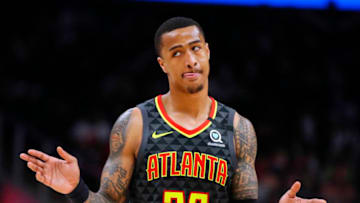 ATLANTA, GA - MARCH 09: John Collins #20 of the Atlanta Hawks reacts during the second half of an NBA game against the Charlotte Hornets at State Farm Arena on March 9, 2020 in Atlanta, Georgia. NOTE TO USER: User expressly acknowledges and agrees that, by downloading and/or using this photograph, user is consenting to the terms and conditions of the Getty Images License Agreement. (Photo by Todd Kirkland/Getty Images)