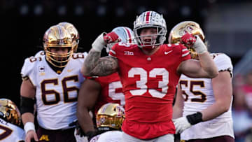 Nov 18, 2023; Columbus, Ohio, USA; Ohio State Buckeyes defensive end Jack Sawyer (33) celebrates a tackle during the first half of the NCAA football game against the Minnesota Golden Gophers at Ohio Stadium.