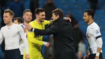 MANCHESTER, ENGLAND - FEBRUARY 14 : Hugo Lloris of Tottenham Hotspur celebrates victory with Mauricio Pochettino the head coach / manager of Tottenham Hotspur after victory in the Barclays Premier League match between Manchester City and Tottenham Hotspur at the Etihad Stadium on February 14, 2016 in Manchester, England. (Photo by Matthew Ashton - AMA)