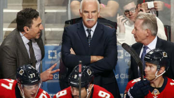 SUNRISE, FL - DECEMBER 12: Florida Panthers Head Coach Joel Quenneville and Assistant Coaches Andrew Brunette and Mike Kitchen map out a plan in the third period against the New York Islanders at the BB&T Center on December 12, 2019 in Sunrise, Florida. (Photo by Eliot J. Schechter/NHLI via Getty Images)