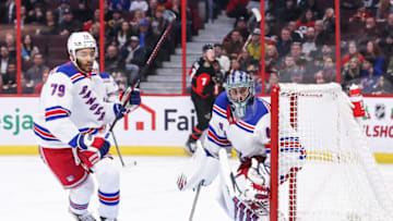 OTTAWA, CANADA - NOVEMBER 30: K'Andre Miller #79 of the New York Rangers and Jaroslav Halak #41 skate against the Ottawa Senators at Canadian Tire Centre on November 30, 2022 in Ottawa, Ontario, Canada. (Photo by Chris Tanouye/Freestyle Photography/Getty Images)