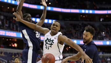 WASHINGTON, DC - MARCH 09: Nick Ward #44 of the Michigan State Spartans looses control of the ball while going up against Mike Watkins #24 and Payton Banks #0 of the Penn State Nittany Lions during the Big Ten Basketball Tournament at Verizon Center on March 9, 2017 in Washington, DC. (Photo by Rob Carr/Getty Images)