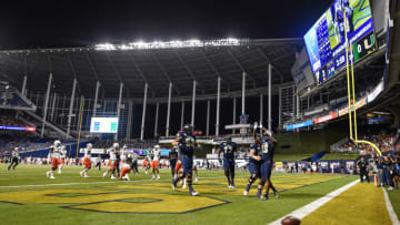 MIAMI, FLORIDA - NOVEMBER 23: Shemar Thornton #19 of the FIU Golden Panthers celebrates after scoring a touchdown against the Miami Hurricanes in the first quarter at Marlins Park on November 23, 2019 in Miami, Florida. (Photo by Mark Brown/Getty Images)