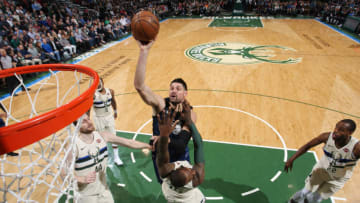 Milwaukee, WI - APRIL 9: Nikola Vucevic #9 of the Orlando Magic shoots the ball against the Milwaukee Bucks on April 9, 2018 at the BMO Harris Bradley Center in Milwaukee, Wisconsin. NOTE TO USER: User expressly acknowledges and agrees that, by downloading and or using this Photograph, user is consenting to the terms and conditions of the Getty Images License Agreement. Mandatory Copyright Notice: Copyright 2018 NBAE (Photo by Gary Dineen/NBAE via Getty Images)