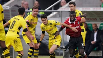HANNOVER, GERMANY - OCTOBER 28: (L-R) Mario Gotze of Borussia Dortmund, Marc Bartra of Borussia Dortmund, Sokratis Papastathopoulos of Borussia Dortmund, Ihlas Bebou of Hannover 96 during the German Bundesliga match between Hannover 96 v Borussia Dortmund at the HDI Arena on October 28, 2017 in Hannover Germany (Photo by Jeroen Meuwsen/Soccrates/Getty Images)