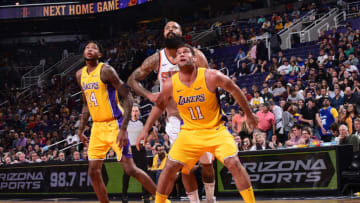 PHOENIX, AZ - NOVEMBER 13: Brook Lopez #11 and Brandon Ingram #14 of the Los Angeles Lakers box out Tyson Chandler #4 of the Phoenix Suns on November 13, 2017 at Talking Stick Resort Arena in Phoenix, Arizona. NOTE TO USER: User expressly acknowledges and agrees that, by downloading and or using this photograph, user is consenting to the terms and conditions of the Getty Images License Agreement. Mandatory Copyright Notice: Copyright 2017 NBAE (Photo by Michael Gonzales/NBAE via Getty Images)