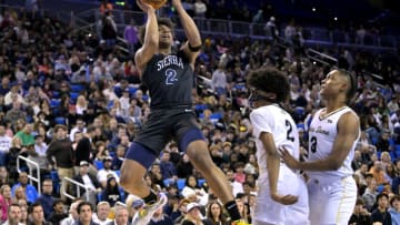 Jan 27, 2023; Los Angeles, CA, USA; Notre Dame Knights forward Zachary White (2) and guard Caleb foster (3) looks on as Sierra Canyon Trailblazers forward Isaiah Elohim (2) shoots a basket in the first half of the Battle of the Valley played at Pauley Pavilion. Mandatory Credit: Jayne Kamin-Oncea-USA TODAY Sports