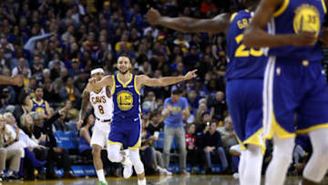 OAKLAND, CALIFORNIA - APRIL 05: Stephen Curry #30 of the Golden State Warriors reacts after making a basket against the Cleveland Cavaliers at ORACLE Arena on April 05, 2019 in Oakland, California. NOTE TO USER: User expressly acknowledges and agrees that, by downloading and or using this photograph, User is consenting to the terms and conditions of the Getty Images License Agreement. (Photo by Ezra Shaw/Getty Images)